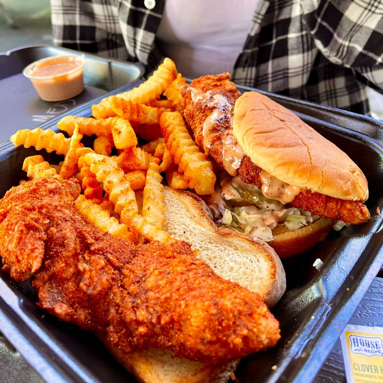 Chikin Drip Slider with Slaw, Pickles, Secret Sauce, and Fries.